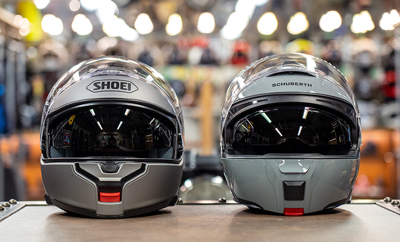 Shoei Neotec 3 next to Schuberth C5